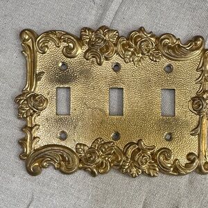 Preowned Ornate Floral Triple Toggle Switch Plate Cover - Gold Finish